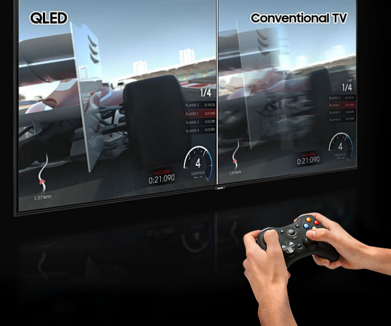 Split Screen Visual Of A Formula One Racing Game On A QLED TV